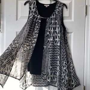 Black and white, silver accented sleeveless blouse